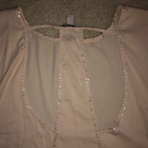 Sheer cap sleeve top with open back detail